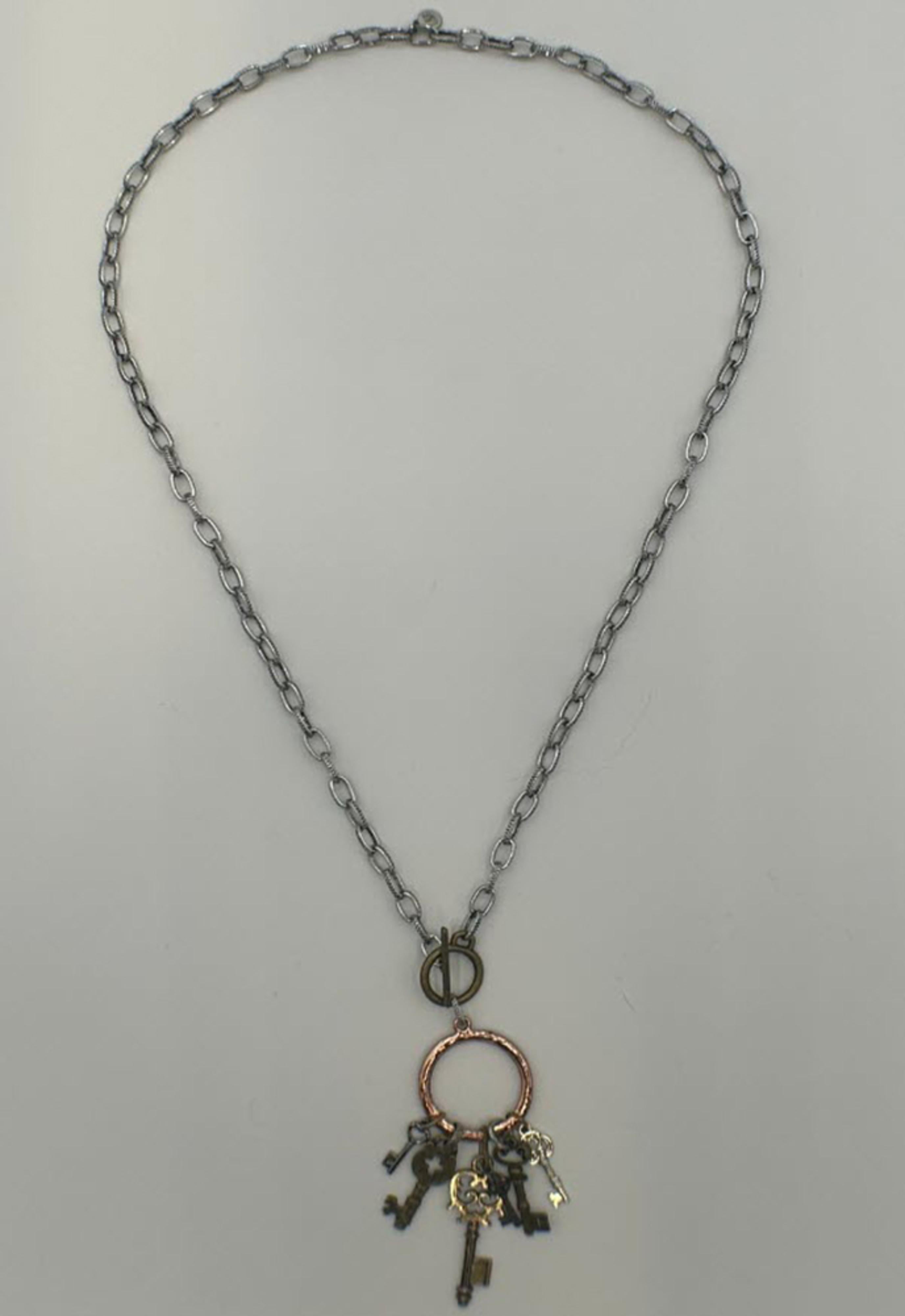 Legend or Lies Keys to the World Mixed Metal Necklace